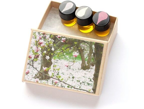 1_Magnolia Grove Perfume Trio_with pack.jpg 1_Magnolia Grove Perfume Trio_with pack.jpg