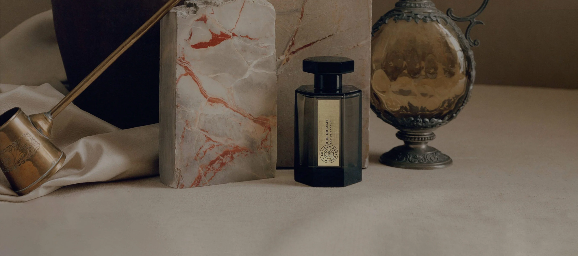 Кристоф Рейно составил для L'Artisan Parfumeur аромат Cuir Grenat